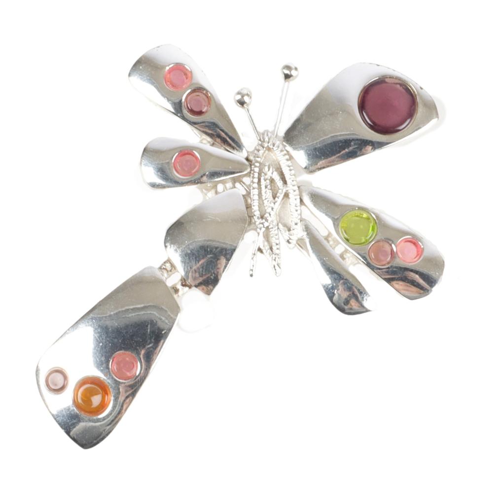 Appraisal: CHRISTIAN LACROIX SILVER TONE ASYMMETRICAL JEWELED BUTTERFLY PIN H X