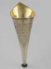 Appraisal: A Russian gilt lined silver holy wine funnel engraved with