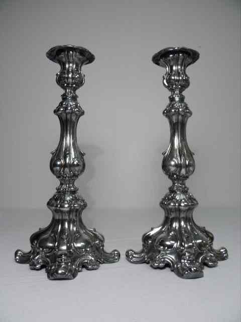 Appraisal: Pair of heavy continental silver plated candlesticks Unmarked each measures