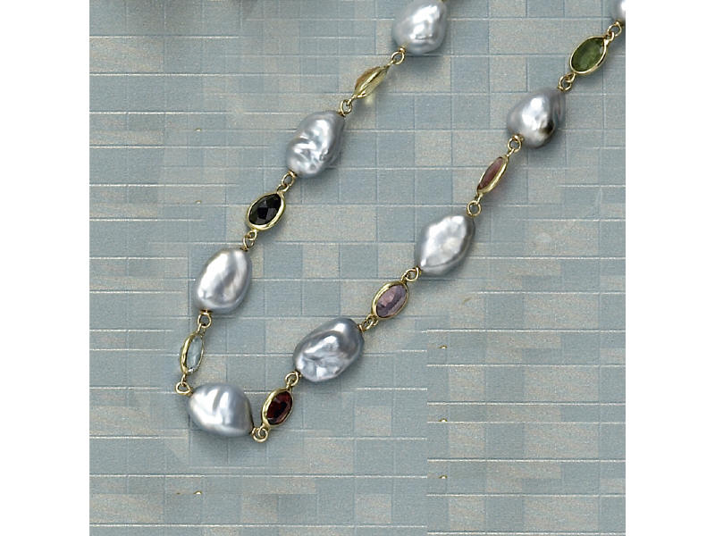 Appraisal: PEARL AND GEMSTONE NECKLACE Baroque silver pearls alternating with oval