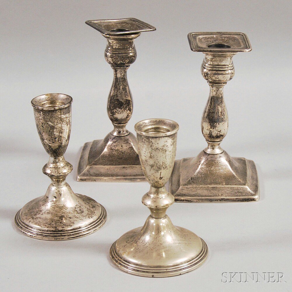 Appraisal: Two Pairs of Weighted Sterling Silver Candlesticks a pair of