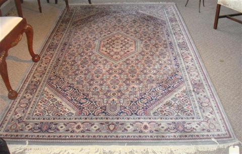 Appraisal: BLUE RED AND GRAY ORIENTAL RUG x Feet Provenance ANTIQUE