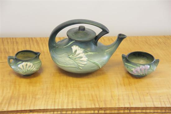 Appraisal: THREE PIECE ROSEVILLE TEASET In green Freesia pattern and consisting