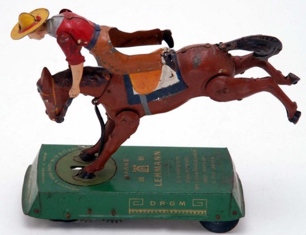 Appraisal: Lehmann wind-up Bucking Bronco Handpainted and lithograph tin Brown horse