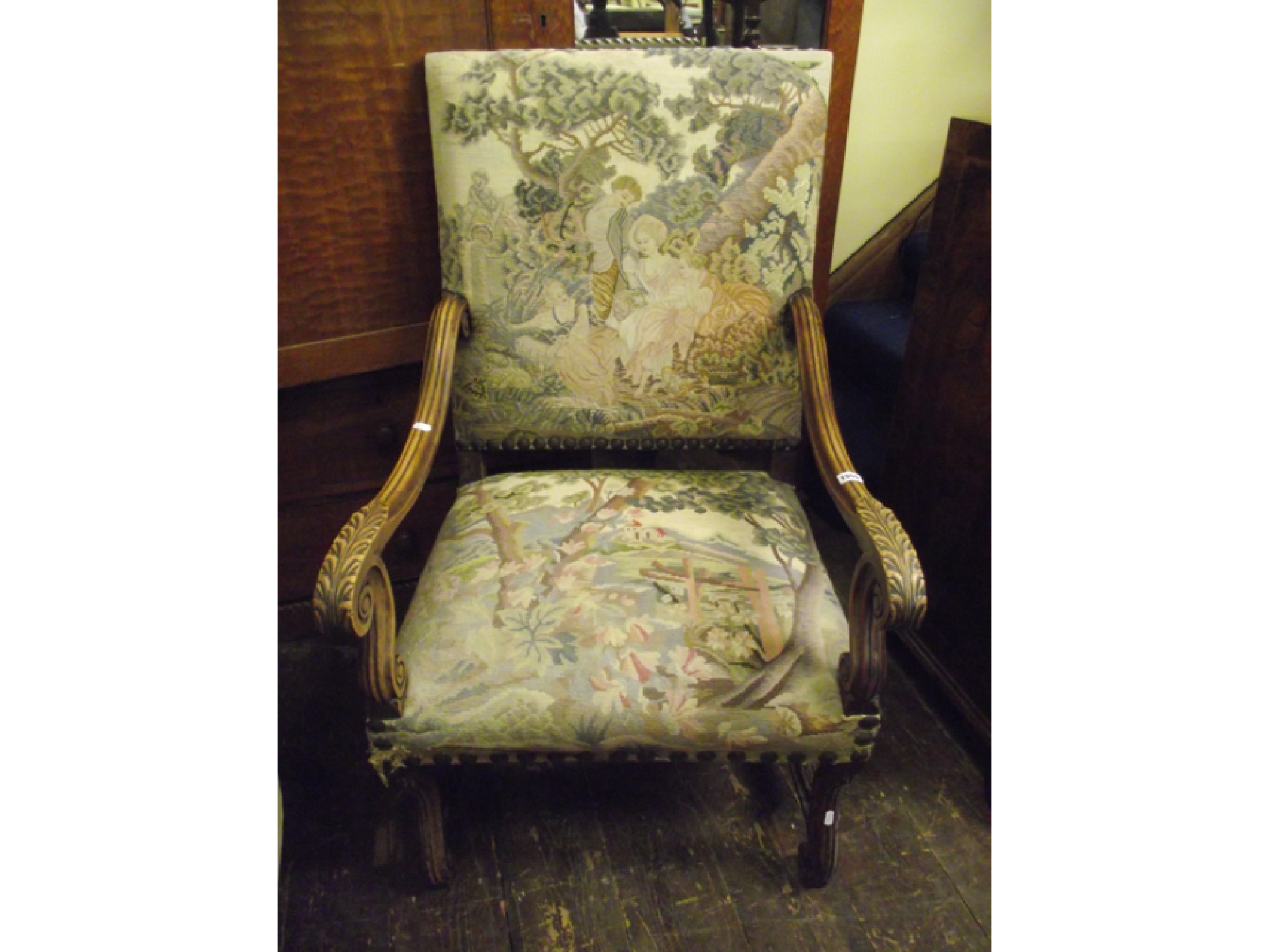 Appraisal: A th century continental elbow chair with hand worked tapestry