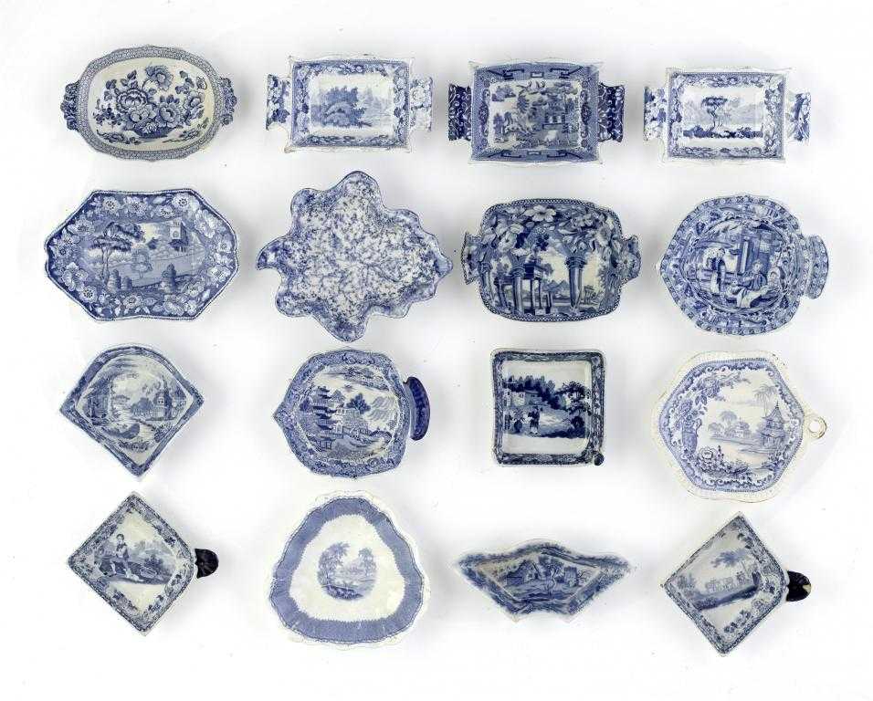 Appraisal: SIXTEEN BLUE PRINTED EARTHENWARE PICKLE DISHES of leaf two handled