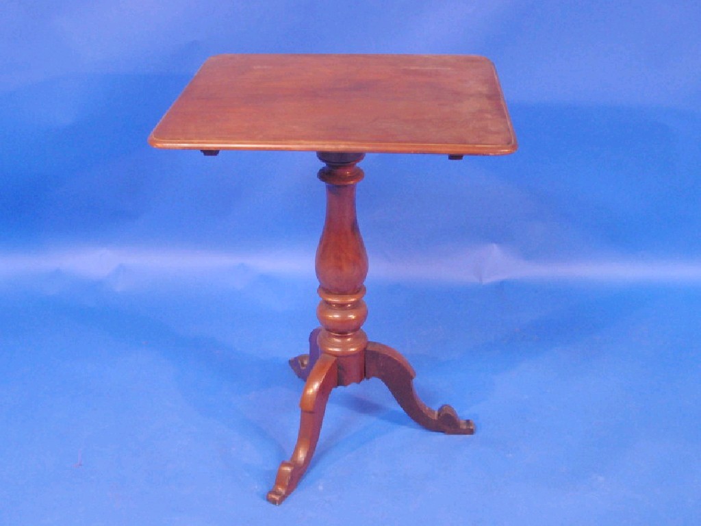 Appraisal: A thC mahogany rectangular tilt top table with thumb moulded