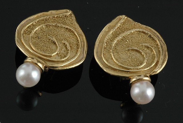 Appraisal: A pair of cultured pearl earrings Having teardrop shaped panels