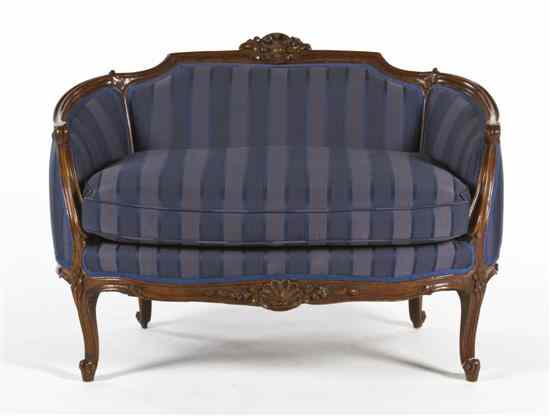 Appraisal: A Louis XV Style Upholstered Settee having a foliate crest