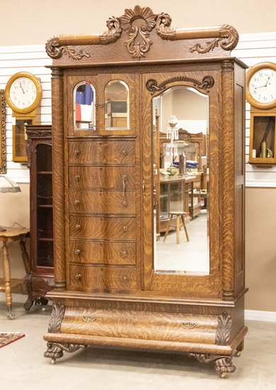 Appraisal: Extremely fine antique quarter sawn oak claw foot Gentleman's Wardrobe