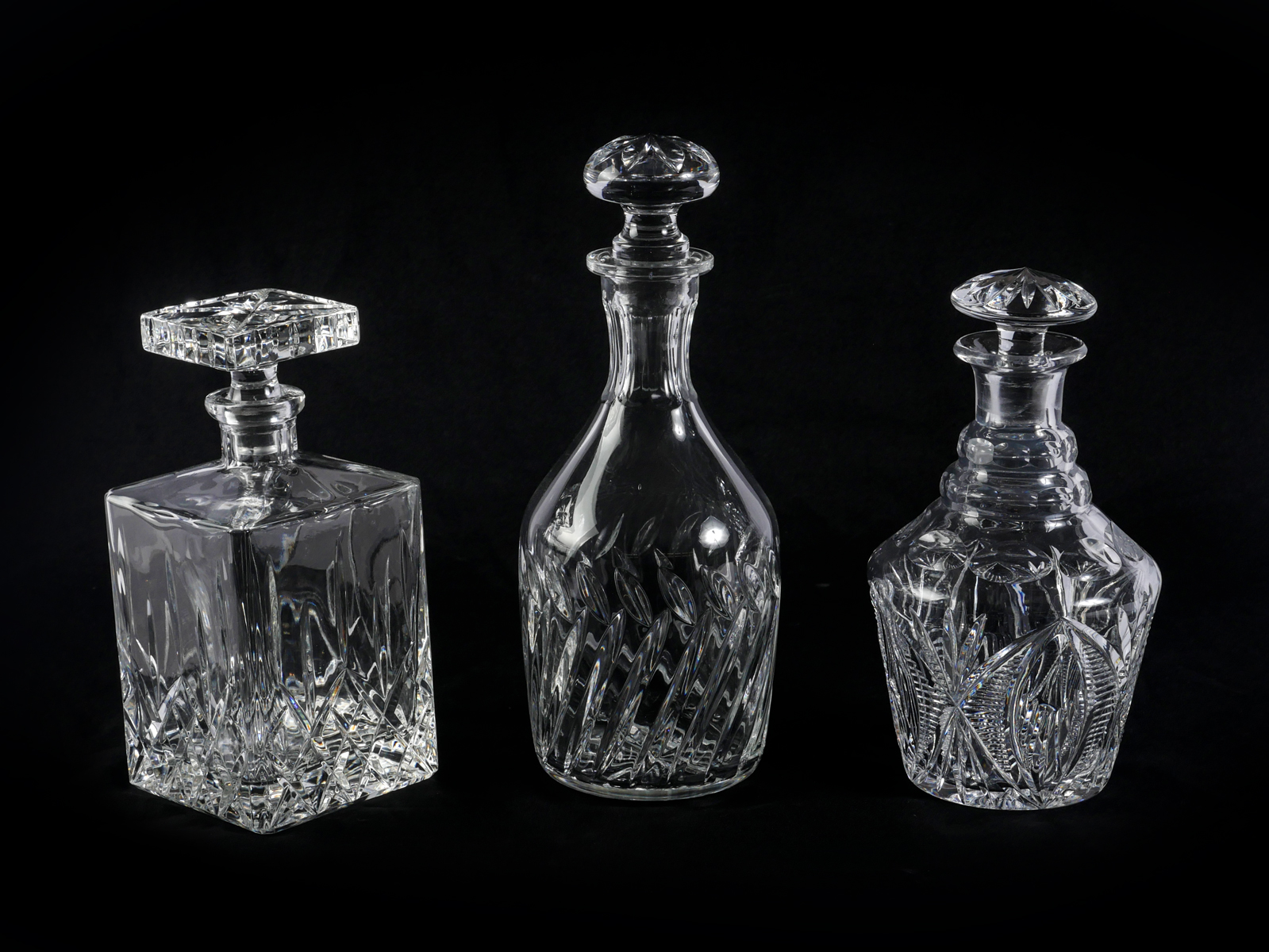 Appraisal: LEAD CRYSTAL AND CUT GLASS DECANTERS Comprising - Square crystal