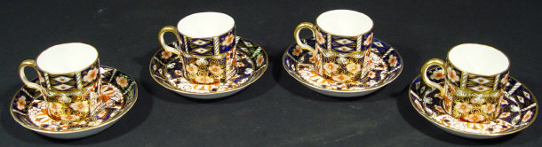 Appraisal: Four Royal Crown Derby coffee cans and saucers each hand