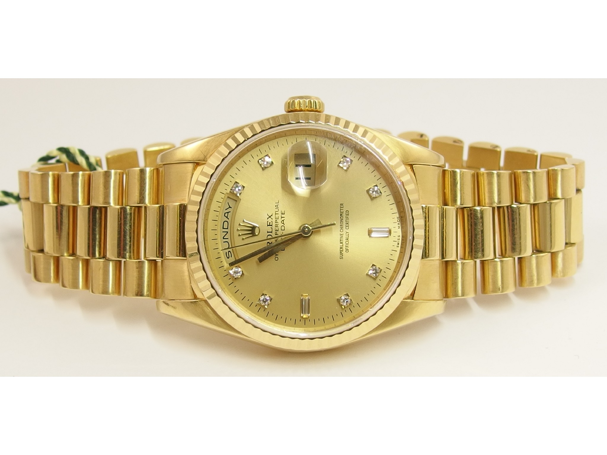 Appraisal: A Gent's ct Rolex Oyster perpetual Day-Datethe gold champagne coloured