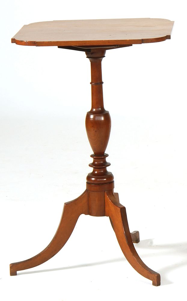 Appraisal: ANTIQUE AMERICAN CANDLESTAND In cherry with cut-cornered top Spider legs