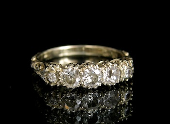 Appraisal: A Diamond and Fold Filigree Ring k white gold band