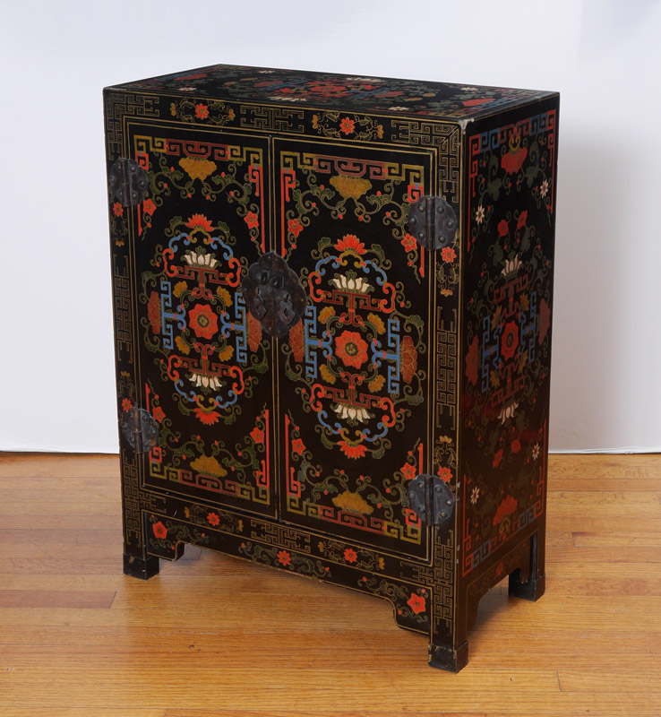 Appraisal: CHINESE POLYCHROME DECORATED LACQUER CABINET Polychrome floral and geometric decoration