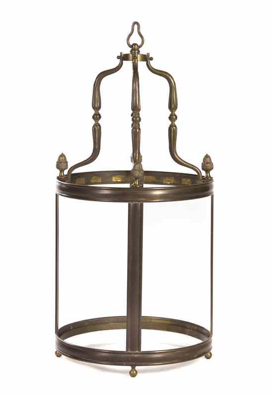 Appraisal: A Neoclassical Bronze Hall Lantern of cylindrical cage form with