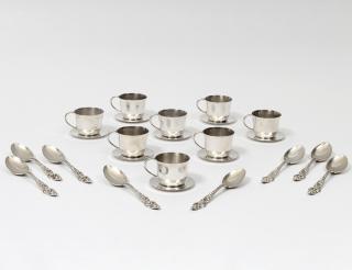 Appraisal: SET OF EIGHT STERLING SILVER MINIATURE CUPS AND SAUCERS American