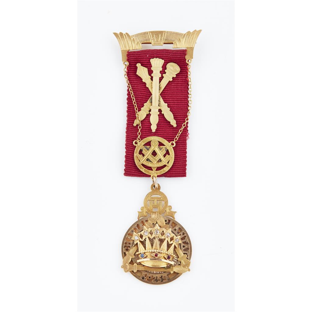 Appraisal: A diamond and gem set Masonic medal red ribband onset