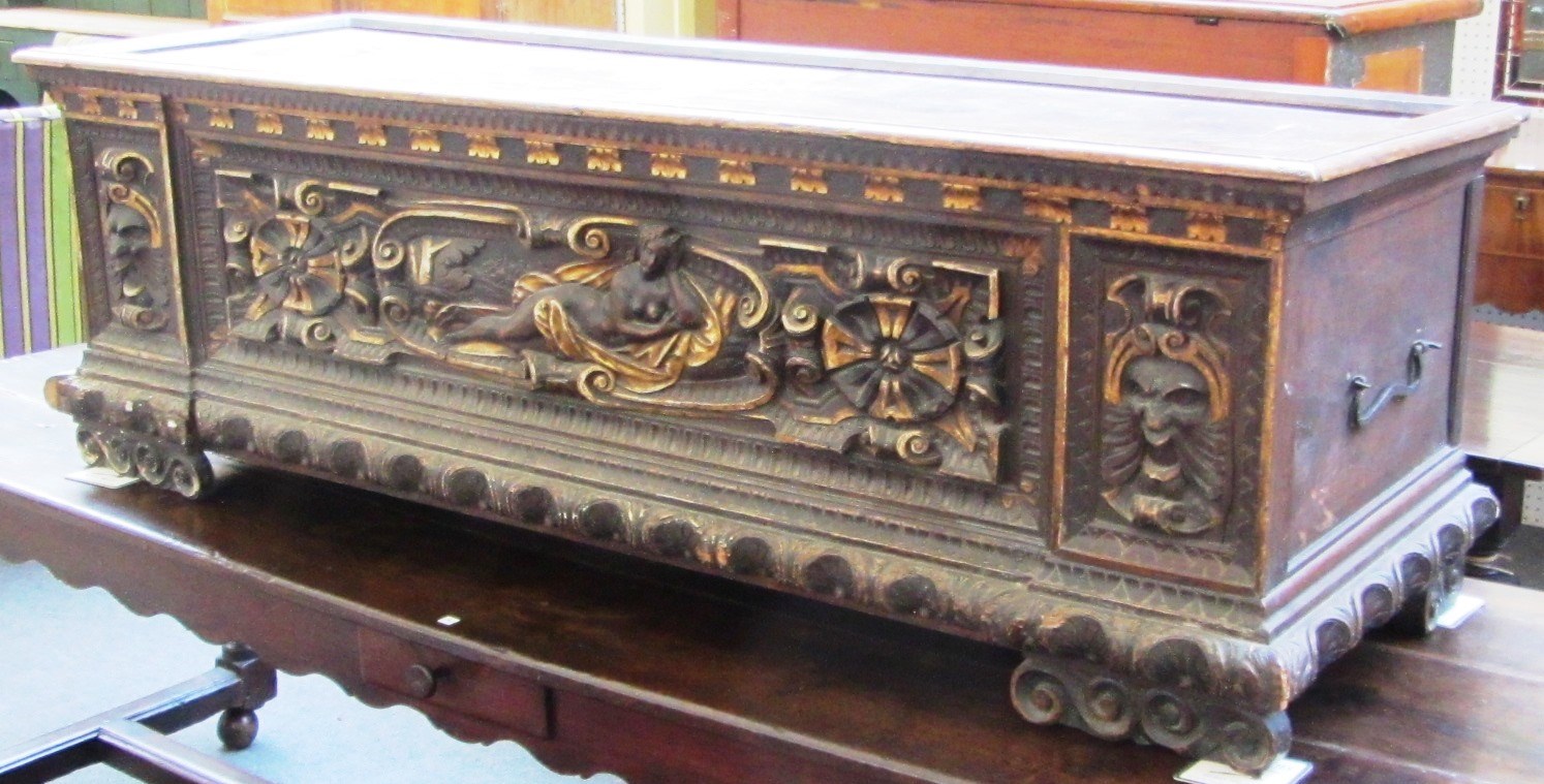 Appraisal: A th century Italian parcel gilt pine and walnut cassone