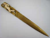 Appraisal: Eugene Bernoud An ormolu letter opener the handle an ivory