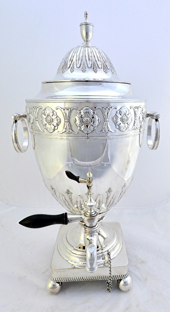 Appraisal: A silver plated large twin handled tea urn the rim