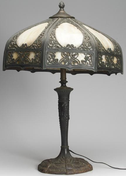 Appraisal: ARTS CRAFTS LIGHTING Table lamp with a shade lined in