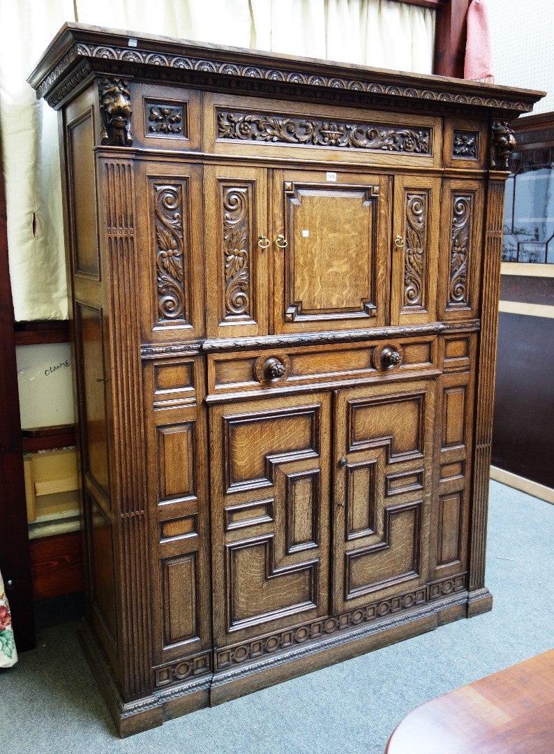 Appraisal: A th century carved oak snooker compendium cupboard with revolving