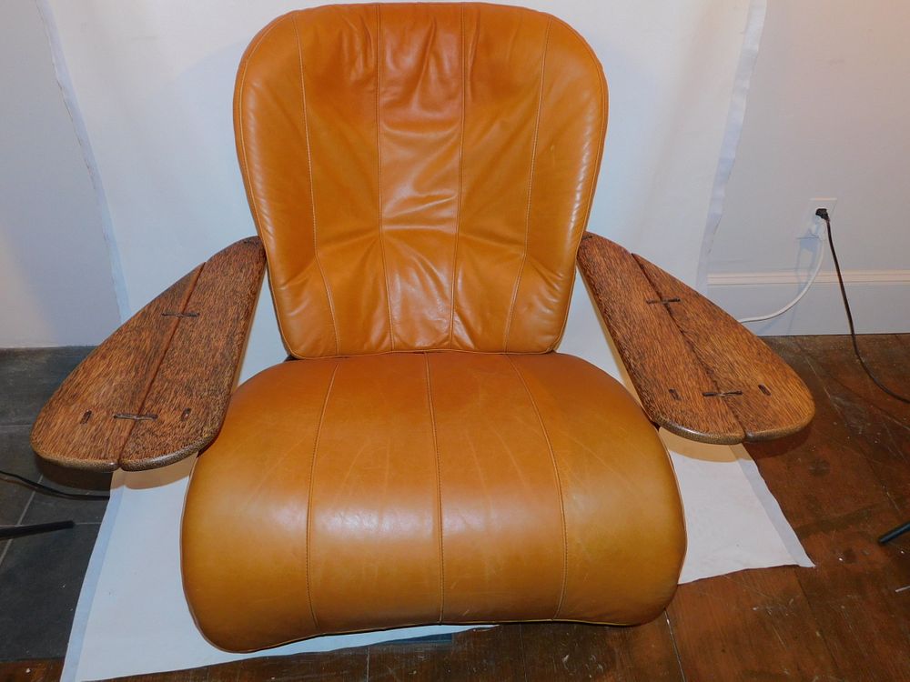 Appraisal: PACIFIC GREEN LEATHER PADDLE ARM CHAIR Large Pacific Green paddle-arm