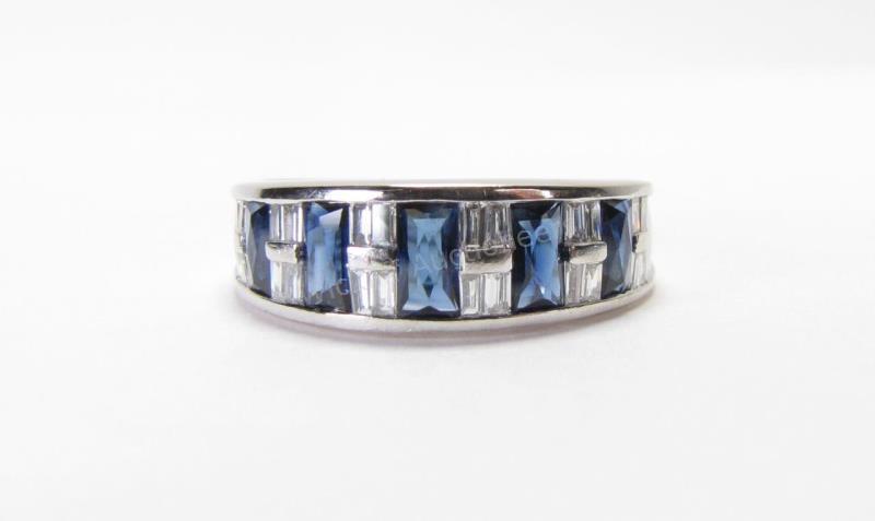 Appraisal: A K white gold ring with five blue sapphires and