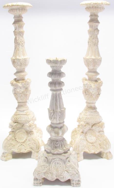 Appraisal: A group of three of plaster candlestands including one pair