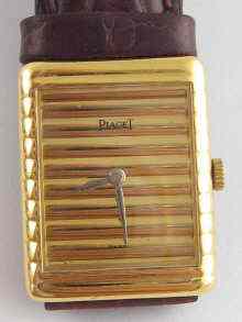 Appraisal: An carat gold wrist watch by Piaget with reeded dial