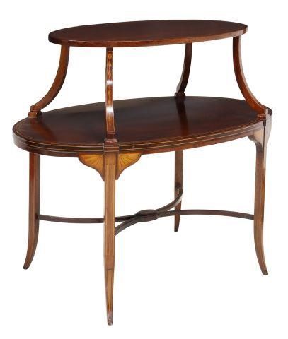 Appraisal: Sheraton style mahogany service table th c two oval tiers