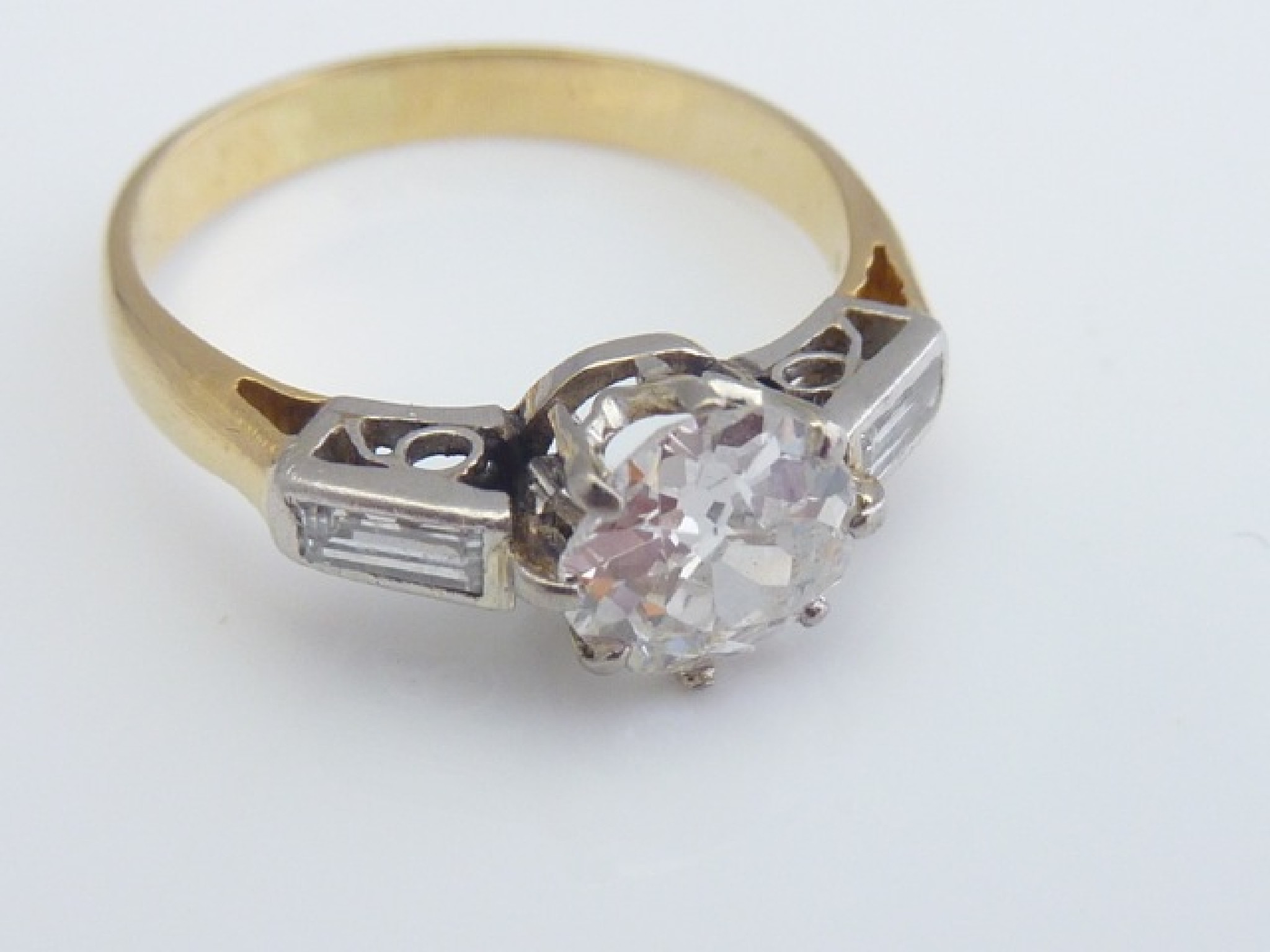 Appraisal: A diamond ring centred with a claw-set old brilliant-cut diamond