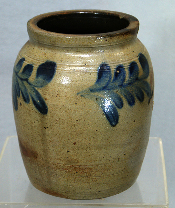 Appraisal: Stoneware jar with blue floral decoration chip in top rim