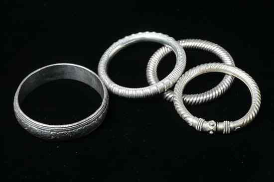 Appraisal: FOUR CHINESE SILVER BANGLES - Largest in long