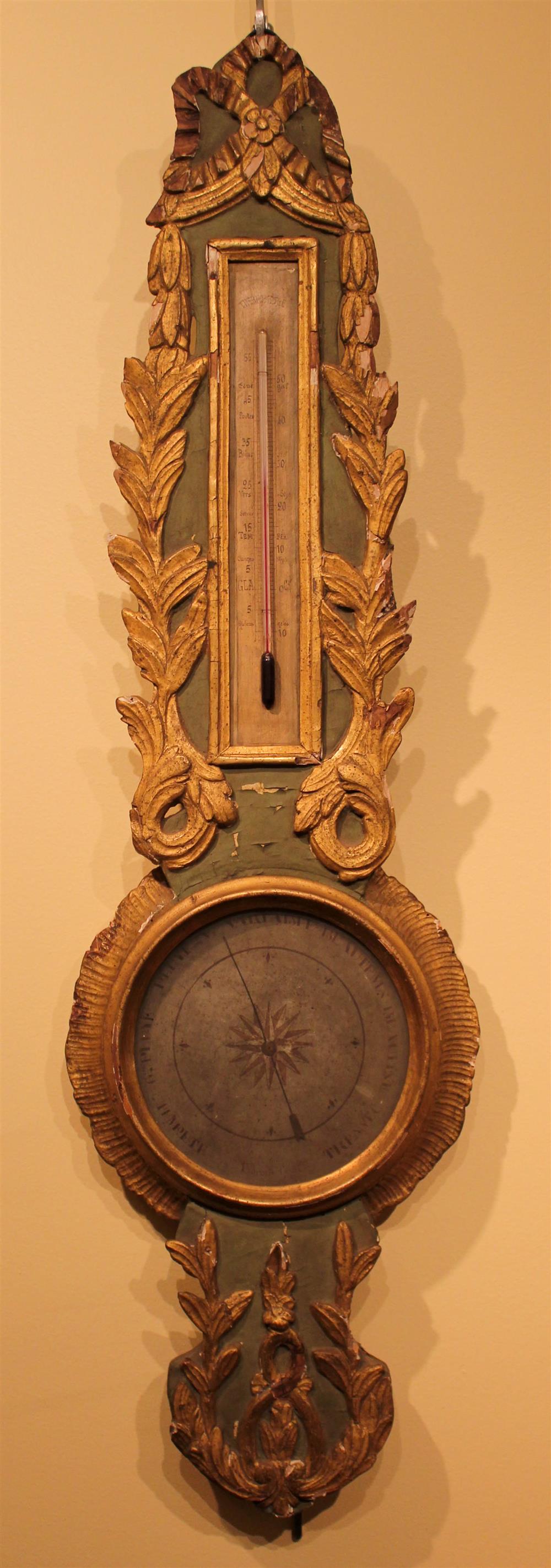 Appraisal: FRENCH DARK CELADON PAINTED AND GILT BAROMETER the leaf tip