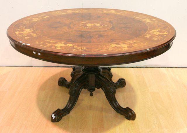 Appraisal: A French transitional style rosewood walnut and inlaid tilt-top breakfast