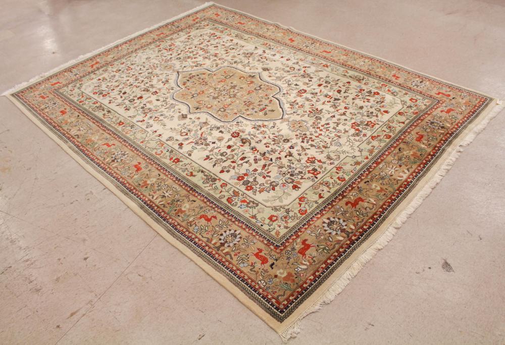 Appraisal: HAND KNOTTED ORIENTAL CARPET Indo-Tabriz floral and central floral medallion