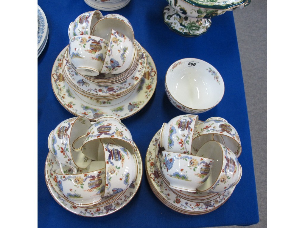 Appraisal: Royal Worcester teaset decorated with butterfly and Chinoiserie scenes