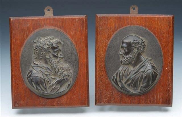 Appraisal: A PAIR OF GRAND TOUR OVAL BRONZE SILHOUETTE PORTRAIT MEDALLIONS