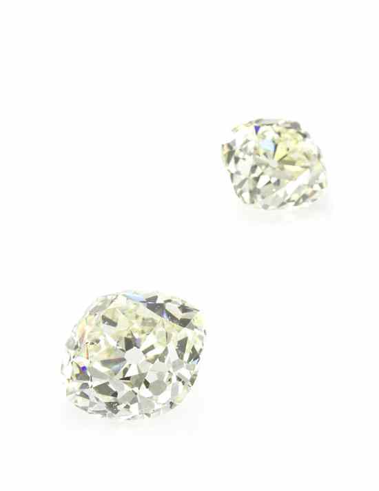 Appraisal: A Pair of Antique Cushion Cut Diamonds weighing approximately carats