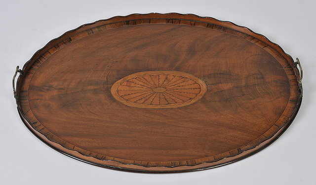 Appraisal: AN EDWARDIAN MAHOGANY AND SATINWOOD INLAID TRAY decorated with an