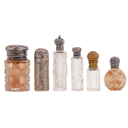 Appraisal: A Victorian cylindrical silver scent bottle engraved with foliate scrolls