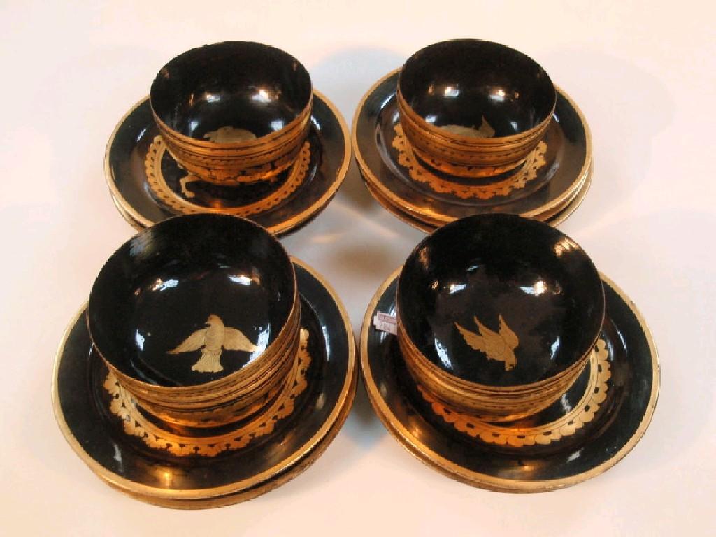 Appraisal: A set of ten black lacquered and gilt painted plates