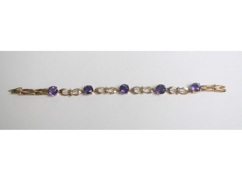 Appraisal: Nine carat gold amethyst set bracelet with five claw set