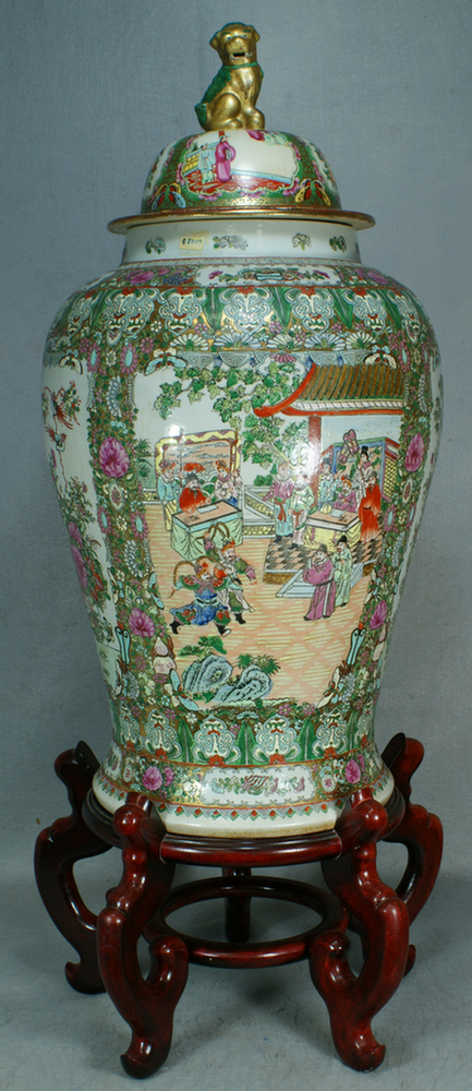 Appraisal: Contemporary Chinese porcelain covered temple jar on a teak stand