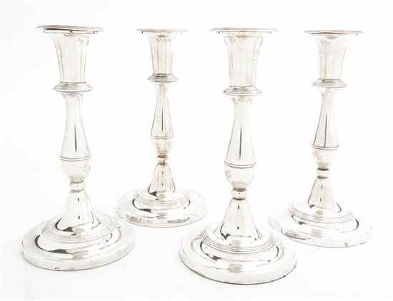 Appraisal: A Set of Four Sheffield Plate Candlesticks likely Matthew Boulton