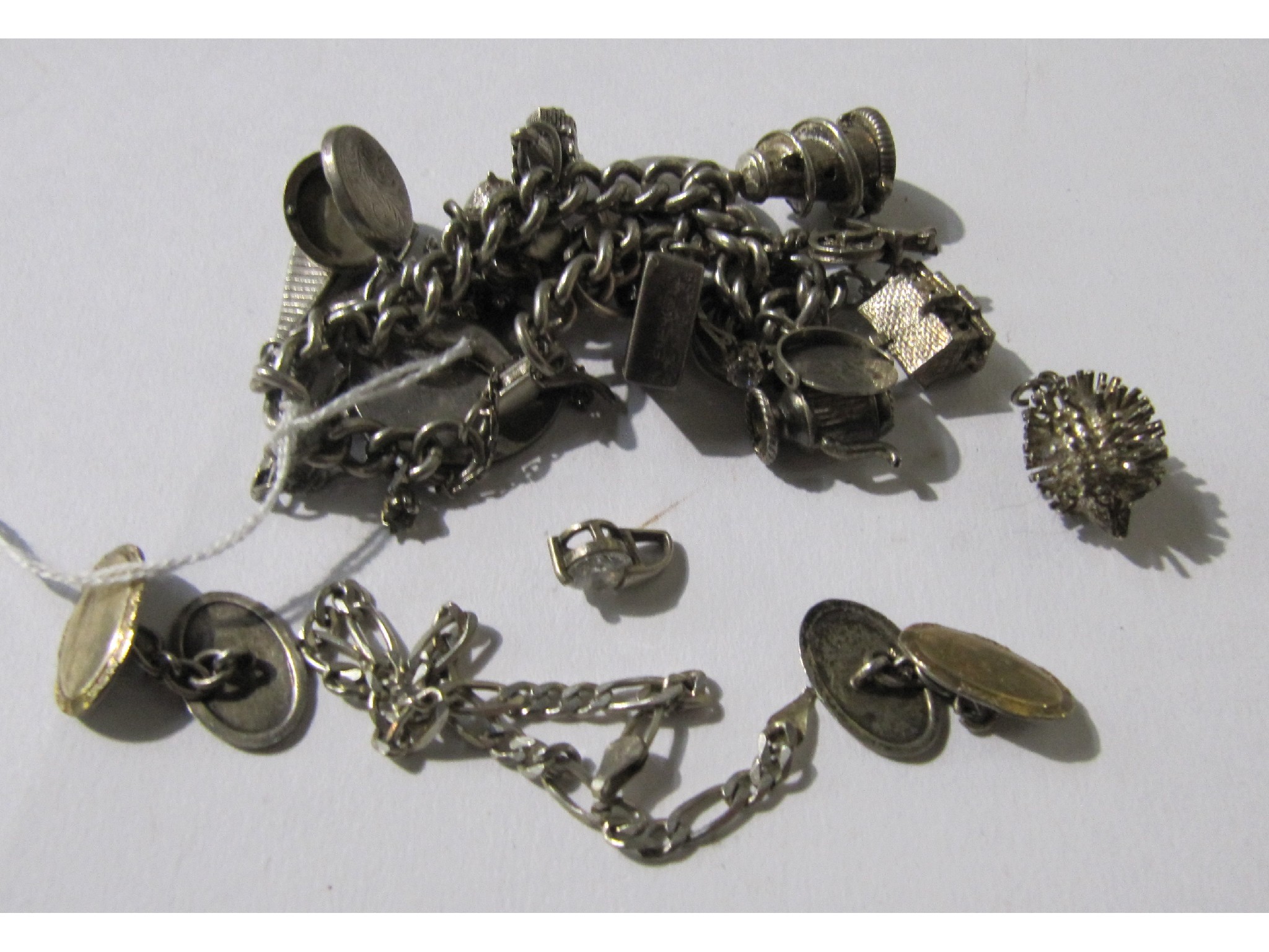 Appraisal: A silver charm bracelet