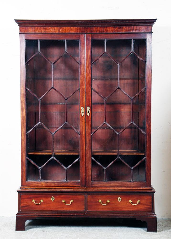 Appraisal: A MAHOGANY BOOKCASE th century and later the moulded cornice